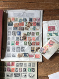 7 stamp books lots of old stamps  5 books with 100s of stamps