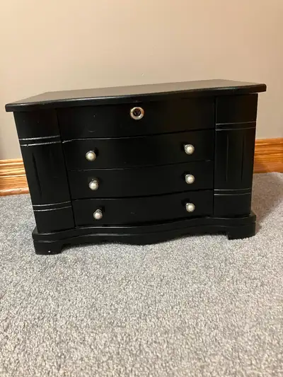 Black jewellery box for sale. No jewelry for sale. We donated it.