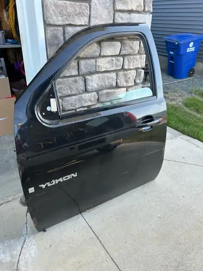 Drivers Side door with glass included. BLACK. No dents or scratches. Small amount of rust along bott...