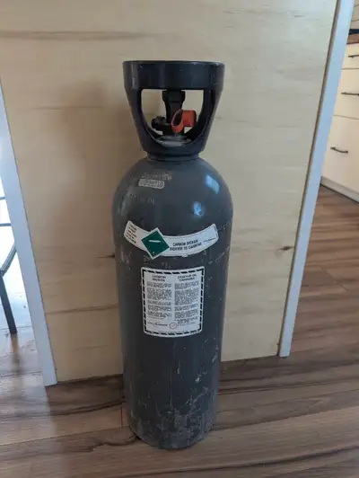 20lb tank used for brewing in good condition. 28" tall. Unknown level remaining.
