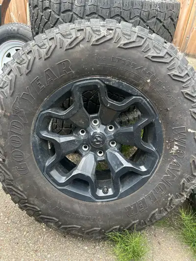 Stock TRX rims from a 2022, Will fit six bolt half ton dodge. Tires have 90% tread. Comes with tire...