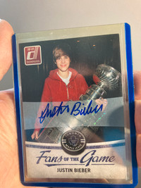 Justin briber signature Donruss 2010- 11 fan of the game 