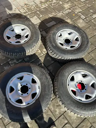 Tires in great shape on rims, used lightly for 2 winters. $800