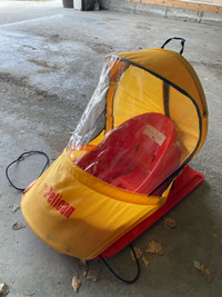 Pelican baby sled with cover