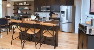Full maple kitchen with quartez countertops hood range microwave and stove included