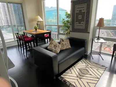 Beautifully Furnished entirely in Elegant Black Furniture. Corner Unit with Panoramic View of City,...