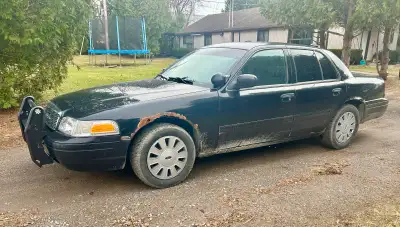 2010 Ford Crown Victoria Police Interceptor. Former OPP radio car. I believe I am the second civilia...