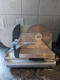 Electric cheese and ham slicer