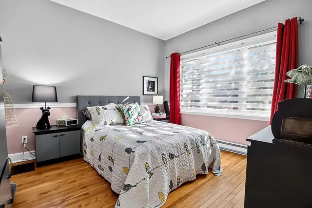 Spacious 4.5-Bedroom Unit Across Two Levels with Basement, Yard, and Above-Ground Pool