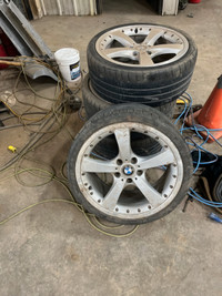 19" chrome BMW rims c/w low profile tires.