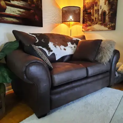 Drastically reduced...taking up space. 72" wide x 38" deep - never used faux suede couch. Bought 2,...