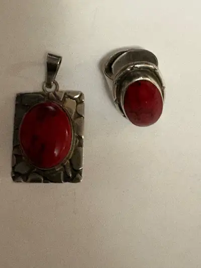 This is a set sterling silver with red jasper jewelry, including an oval ring and square pedant. Thi...