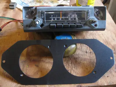 Working radio from a mid 70's Dart. Will fit other A bodies. Checked out at a radio shop where new o...