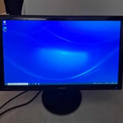 The monitor is in good working condition with no dead pixels. However, there's visible wear on the b...
