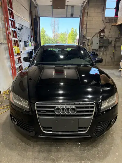 This 2012 Audi A5 S Line features a powerful 2.0L turbocharged engine and classic German engineering...