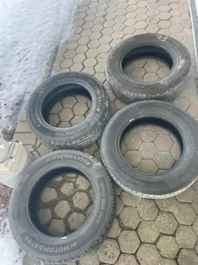 Two are Continental ProContact and two are Motomaster Hyrda Edge Tour. The Motomaster were put on la...