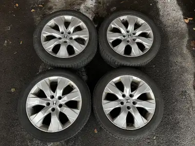 Michelin x ice winter tires on original honda rims. Good tread left and rims are good condition. Sen...