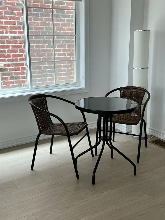 Black tempered glass table with two wicker chairs in Other Tables in City of Toronto - Image 3