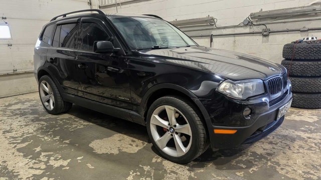 2009 BMW x3 — photo 2