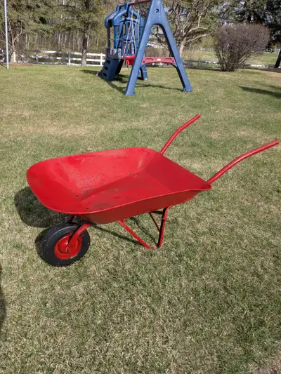 Wheelbarrow with medal frame and solid rubber tire. Ideal for small around the yard jobs or makes a...