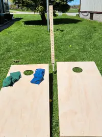 Cornhole boards and bags with score stick 