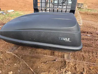 I'm selling a Thule Excursion cargo carrier, perfect for adding extra storage to your vehicle. This...