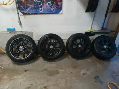 These are used Cobalt rims in decent condition, featuring a sleek black finish and a sporty design....