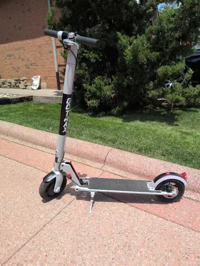 Navigate your daily commute with this reliable Gotrax electric scooter, featuring a sturdy frame, re...
