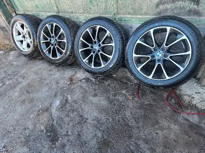 Set of (3) 19" rims and tires off bmw X5. 3 rims are 19" with almost brand new 255 50 19 winter tire...
