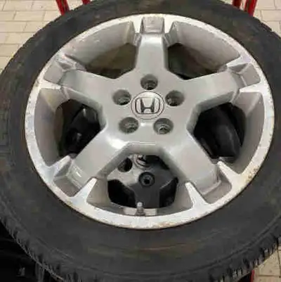 I am selling a set of used Honda Element SC wheels that are fitted with Michelin X-Ice Snow tires, s...