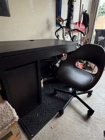 Good condition ikea micke desk with swivel height adjustable chair. The opening for the door is slig...