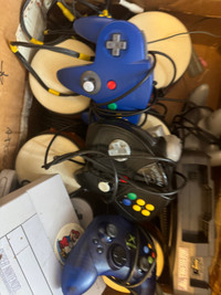 Nintendo consoles/ controllers/ adapters/ bongos etc