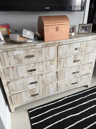 1 wooden dresser and 2 nightstands, View more