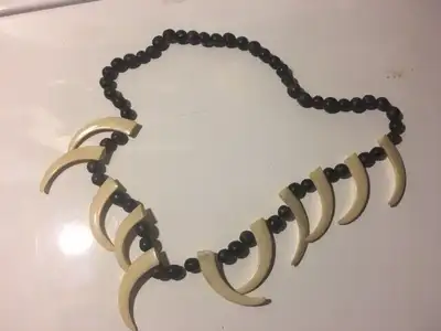 A Primitive Looking Claw Necklace. Cool Apocalypse gear fashion, View more