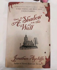 3/$15 A Shadow on the Wall by Jonathan Aycliffe