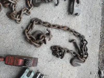 Assorted frame pullers guy chart clamps chains