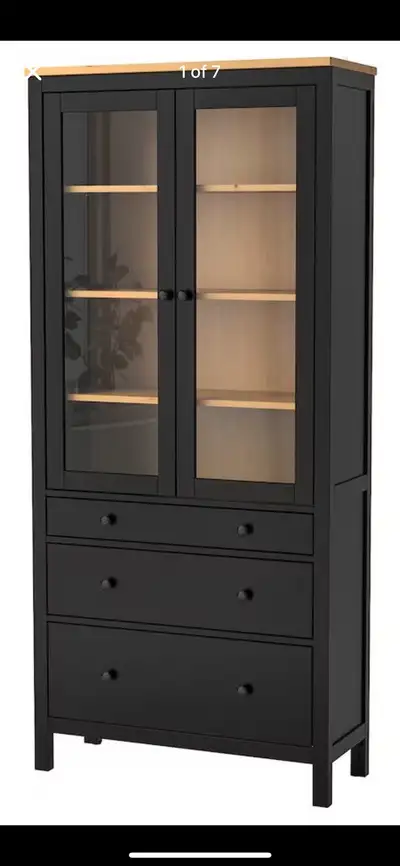 This is a used IKEA Billy bookcase with glass doors and three drawers, perfect for adding storage an...