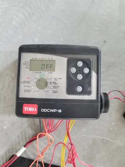 Selling a Toro sprinkler system powered by batteries, 2x9 V. The set includes six 9 V DC solenoids,...