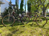 His and hers matching vintage Raleigh cruiser bikes