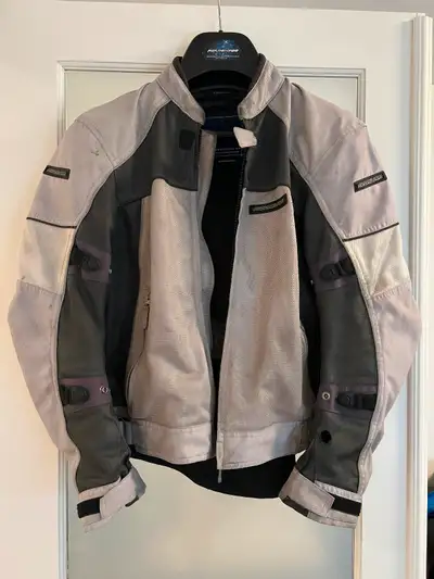 Mesh jacket, size Large. Includes shoulder, elbow, and spine protection. Fair condition.