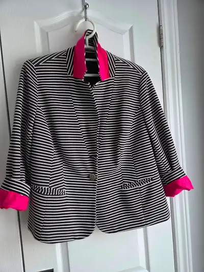 Smart-looking women's jacket with roll-up pink cuff and collar option. Size 16, in immaculate condit...