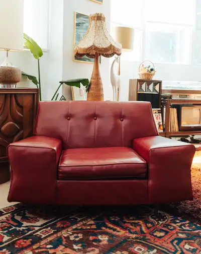 1970s Oxblood Vinyl Lounge Chair | Low Profile Club Chair, View more
