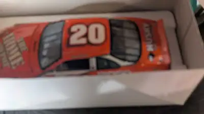 Own a piece of NASCAR history with this Tony Stewart #20 The Home Depot diecast car, a 1:24 scale co...