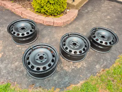 4 vw steel rims. 16 inch Good condition. $100.00 great for wnter rims. Dave your alloys. Pay for the...
