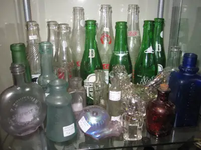Hundreds of beautiful, old bottles. Most of these are from the late 1800's. Some are early 1900's an...