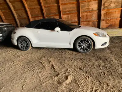 2012 Mitsubishi eclipse spyder convertible, tinted out with black window pillars, great on fuel, las...