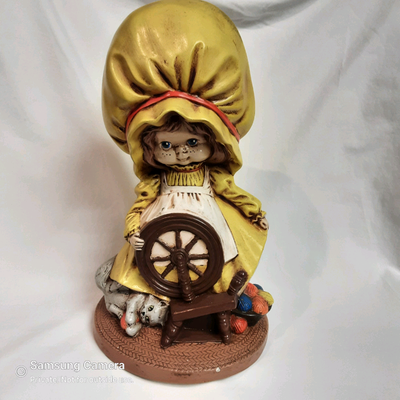 Signed M.E. Morris on a Master hand painted characature figure by Byron Molds. Bright colors on a st...