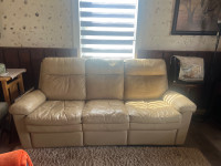 Real leather reclining sofa , in used/working condition  