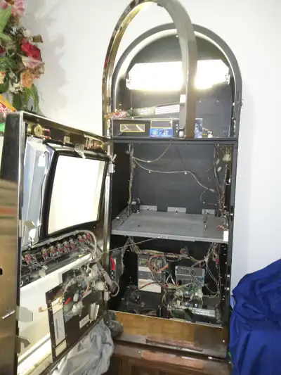 For Sale Slot Machine cabinet with lighting a vintage Novelty Item this is a non functional Slit Mac...