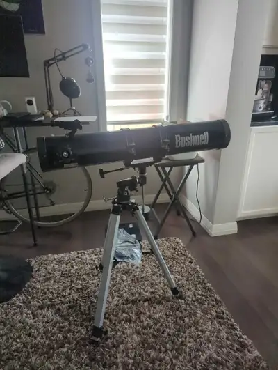 Explore the cosmos with this used Bushnell telescope, perfect for stargazing enthusiasts of all leve...